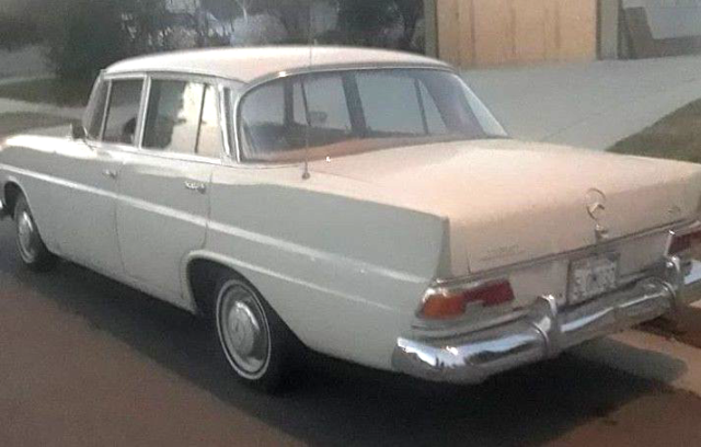 1967 cream Mercedes-Benz 200-Series