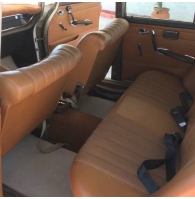 1967 cream Mercedes-Benz 200-Series