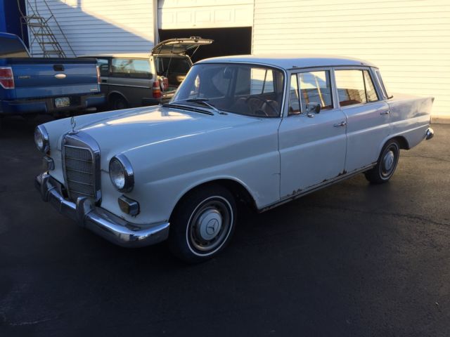 1967 White Mercedes-Benz 200-Series Sedan
