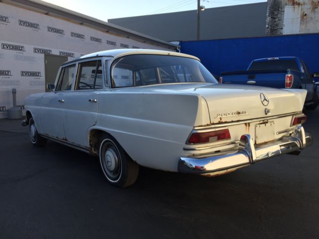 1967 White Mercedes-Benz 200-Series Sedan