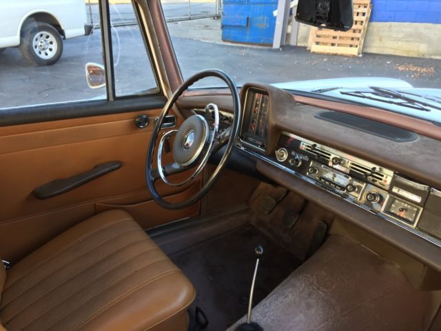 1967 White Mercedes-Benz 200-Series Sedan