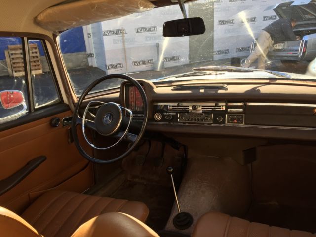 1967 White Mercedes-Benz 200-Series Sedan