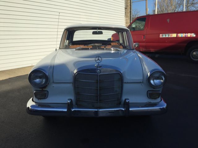 1967 White Mercedes-Benz 200-Series Sedan