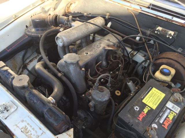 1967 White Mercedes-Benz 200-Series Sedan