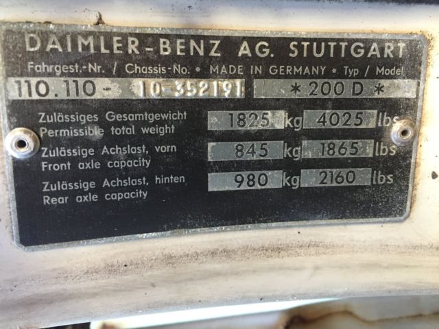 1967 White Mercedes-Benz 200-Series Sedan