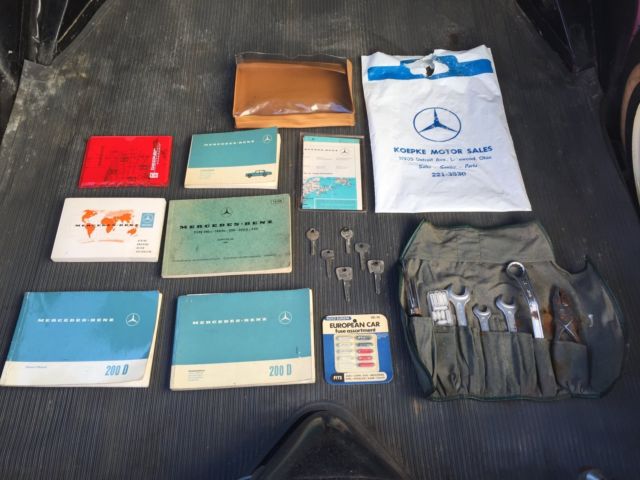 1967 White Mercedes-Benz 200-Series Sedan