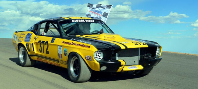 1967 Yellow and Black Ford Mustang Fastback
