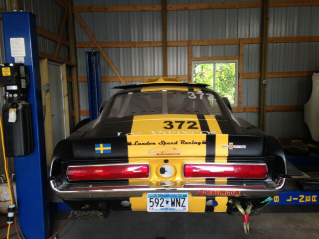 1967 Yellow and Black Ford Mustang Fastback