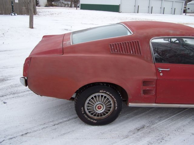 1967 red Ford Mustang