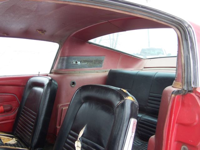 1967 red Ford Mustang