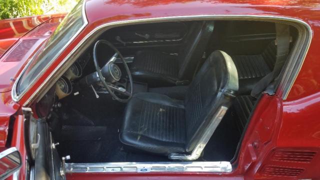 1967 red Ford Mustang fastback