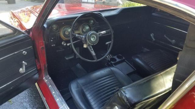 1967 red Ford Mustang fastback