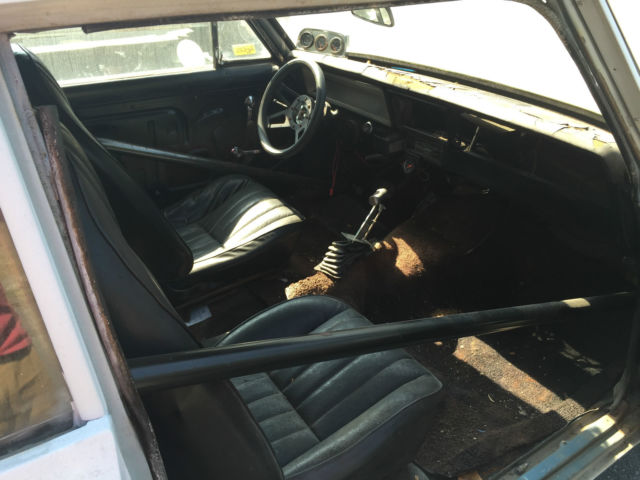 1967 primed Chevrolet Nova coupe