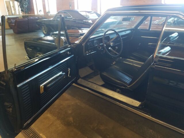 1967 Black Plymouth GTX