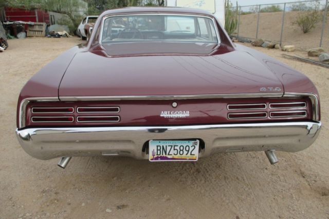 1967 Burgundy Pontiac GTO