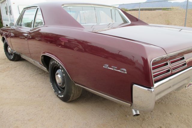 1967 Burgundy Pontiac GTO