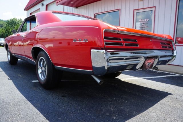 1967 Red Pontiac GTO --