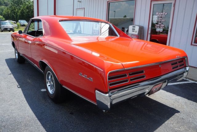 1967 Red Pontiac GTO --