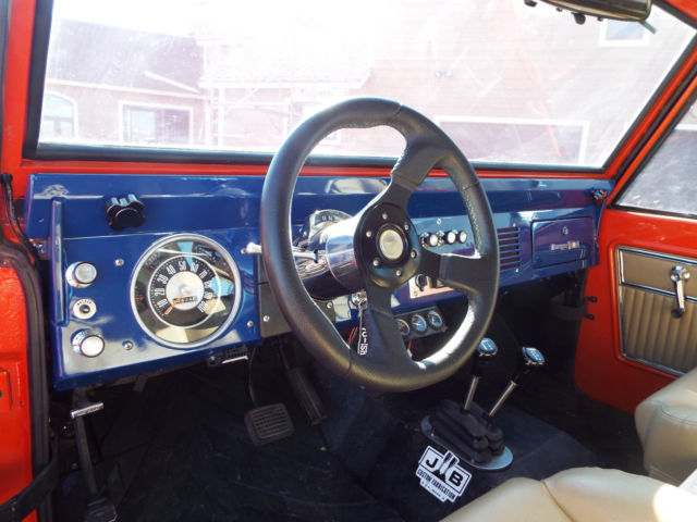 1967 Orange, white and blue Ford Bronco Coupe