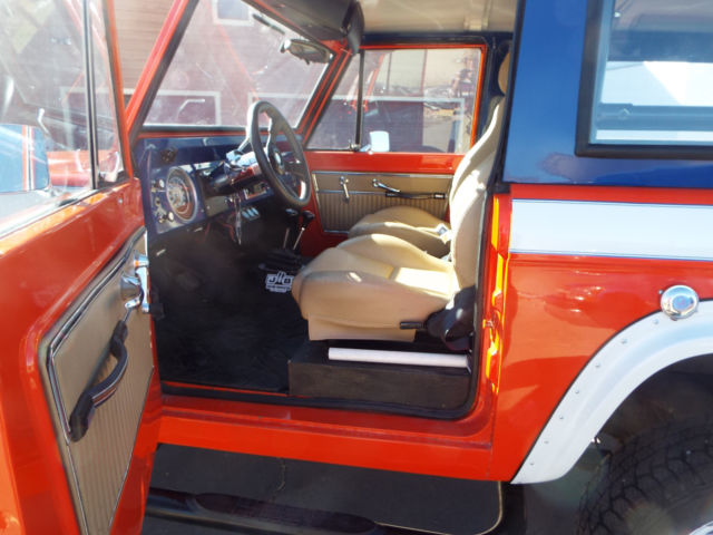 1967 Orange, white and blue Ford Bronco Coupe