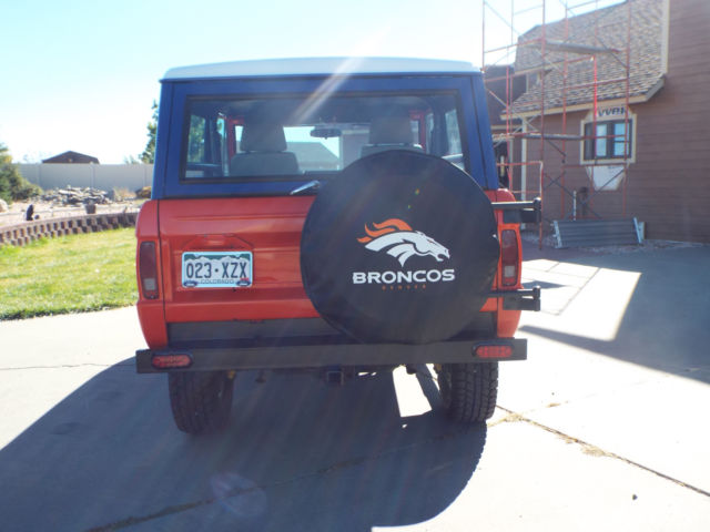 1967 Orange, white and blue Ford Bronco Coupe