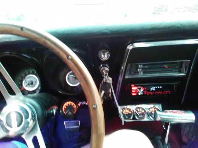 1967 red Chevrolet Camaro Coupe