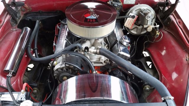 1967 red Chevrolet Camaro Coupe