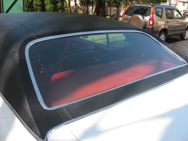 1968 white with black vinyl top Chevrolet Chevelle two door hard top