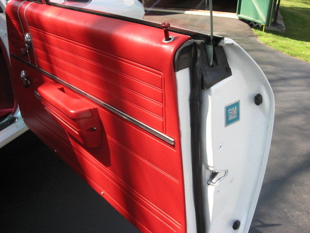 1968 white with black vinyl top Chevrolet Chevelle two door hard top