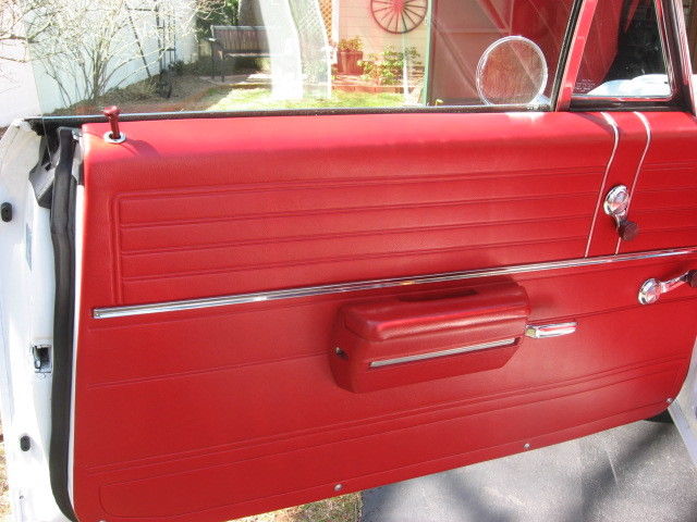 1968 white with black vinyl top Chevrolet Chevelle two door hard top