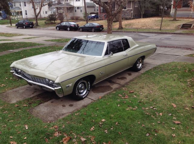 1968 light green Chevrolet Impala 2 DR