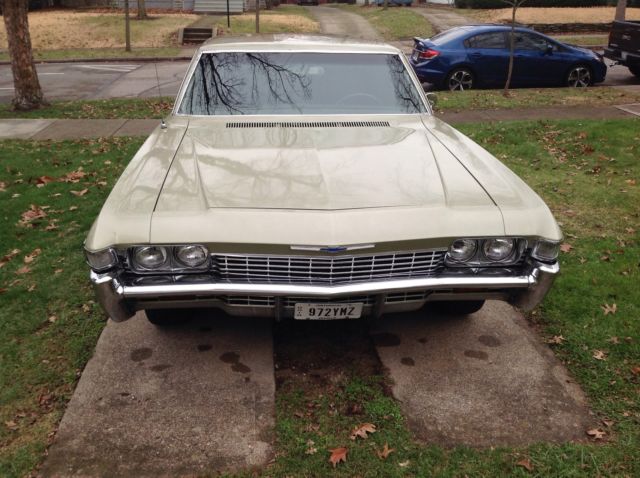 1968 light green Chevrolet Impala 2 DR