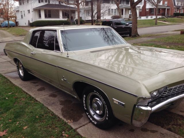 1968 light green Chevrolet Impala 2 DR