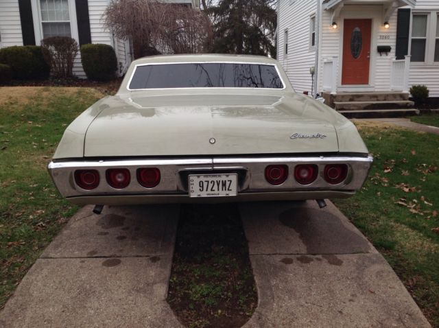 1968 light green Chevrolet Impala 2 DR