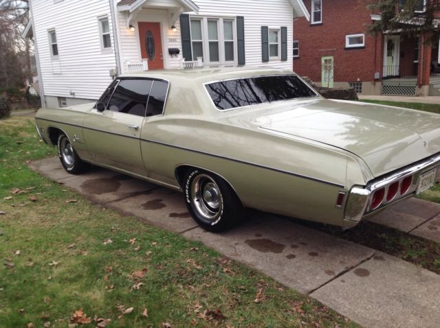 1968 light green Chevrolet Impala 2 DR