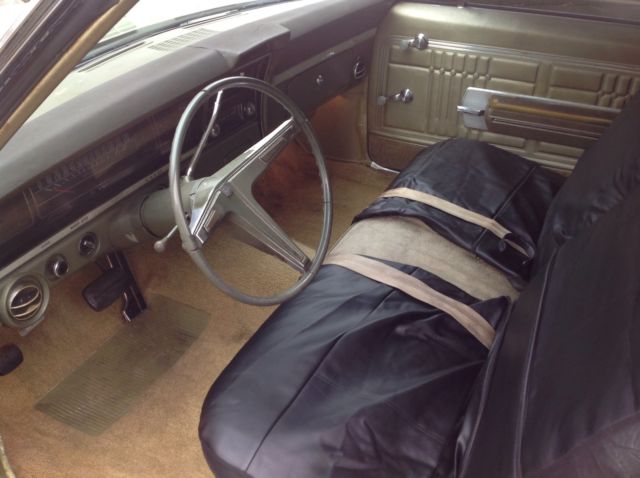 1968 light green Chevrolet Impala 2 DR