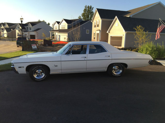 1968 white Chevrolet Impala Sedan