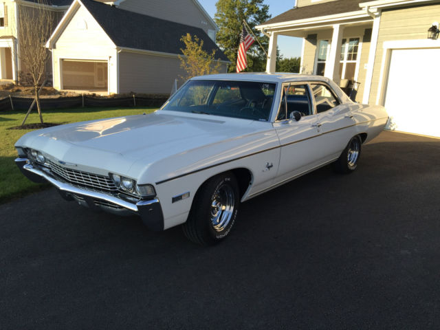 1968 white Chevrolet Impala Sedan