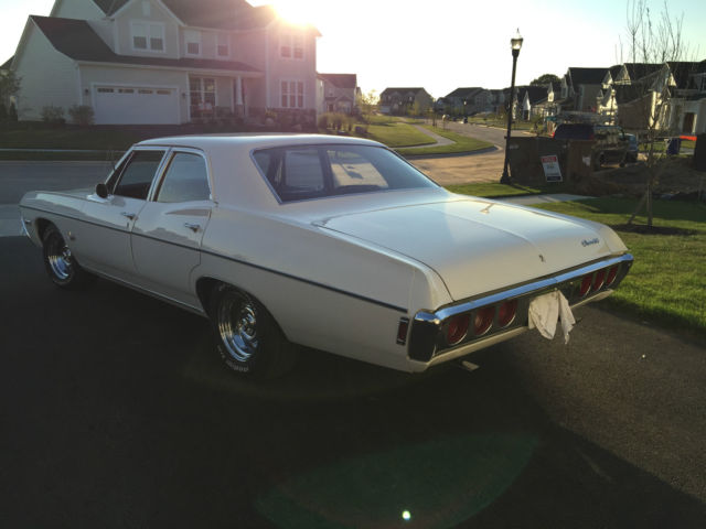 1968 white Chevrolet Impala Sedan