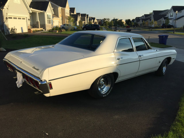 1968 white Chevrolet Impala Sedan