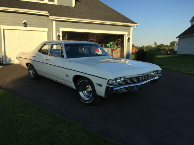 1968 white Chevrolet Impala Sedan