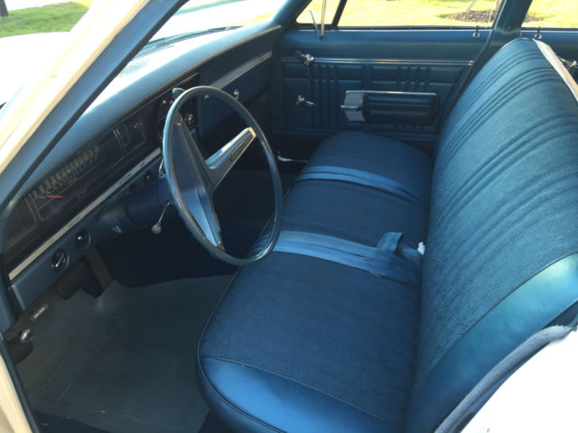 1968 white Chevrolet Impala Sedan