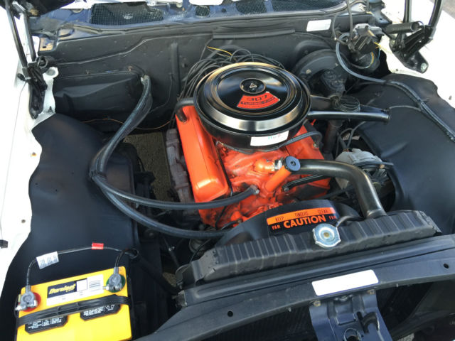 1968 white Chevrolet Impala Sedan