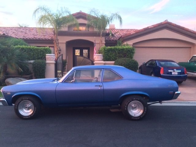 1968 baby blue fade Chevrolet Nova