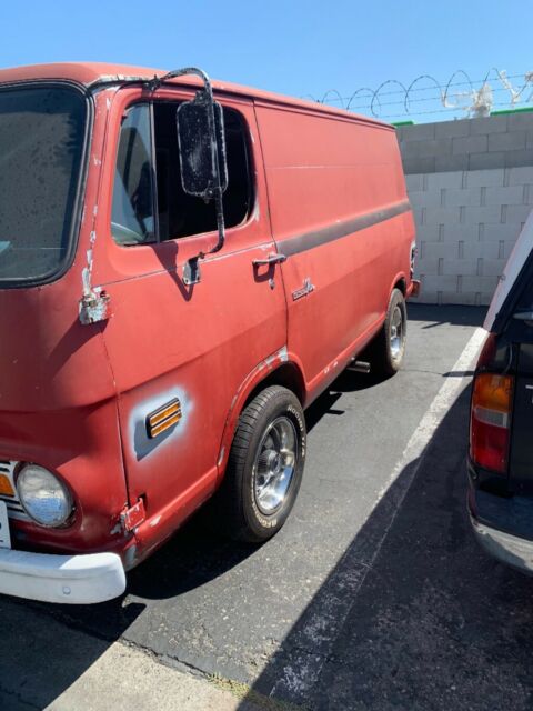 1968 Red with gray primer Chevrolet G10 Van Standard Passenger Van