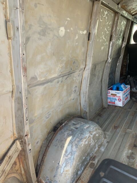 1968 Red with gray primer Chevrolet G10 Van Standard Passenger Van