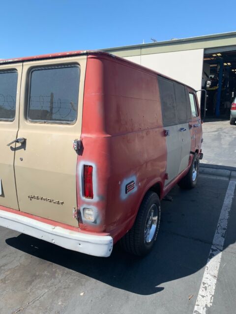 1968 Red with gray primer Chevrolet G10 Van Standard Passenger Van