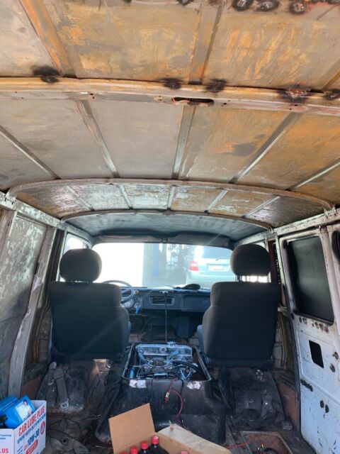 1968 Red with gray primer Chevrolet G10 Van Standard Passenger Van