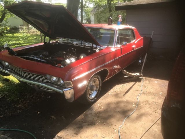 1968 Red Chevrolet Impala Coupe