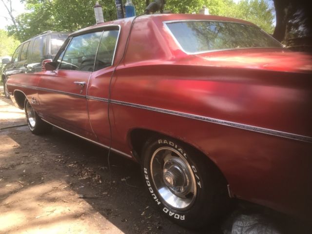 1968 Red Chevrolet Impala Coupe